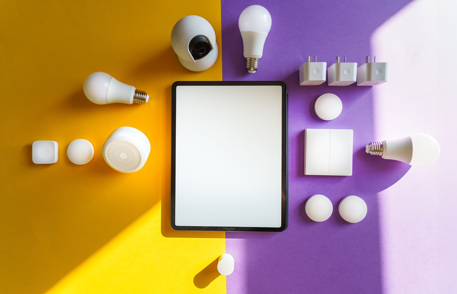 IKEA smart home devices including sensors and lighting arranged on a shelf in a living room